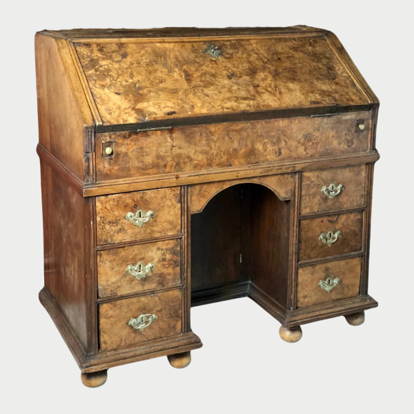 C1700 burr walnut kneehole bureau on original bun feet