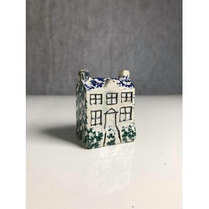 Small pottery money box in the form of a cottage Front