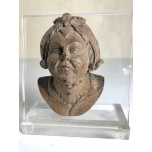 16c carving of female head now mounted Front Face