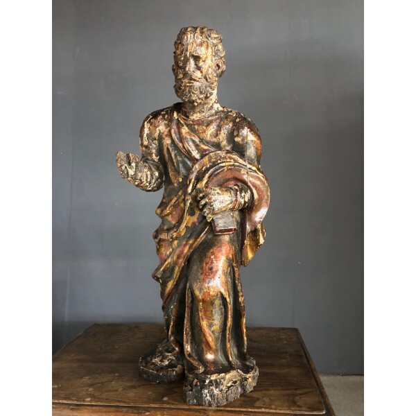 Very good carved figure of a saint c1580 with original gilding and painted decoration