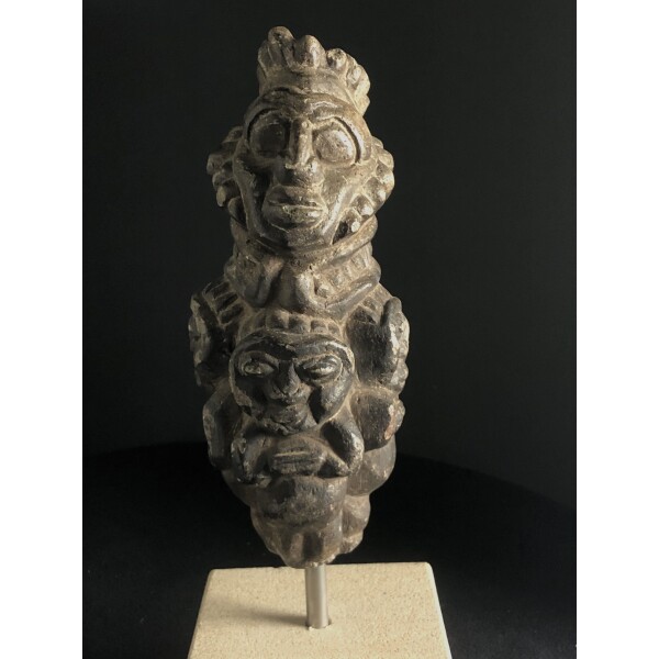 Early carved stone head with 3 lower figures, Mexican Front