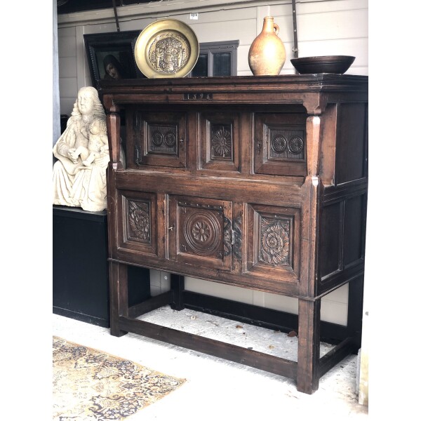 A good carved and dated 16th century Oak Court cupboard. Oak very good condition 