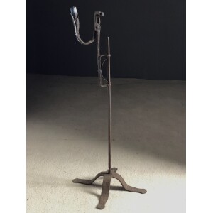 A late 17th Century floor standing rushlight and wax candle stand