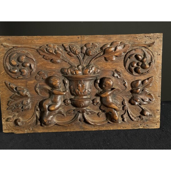 A late 17th Century Carved Oak Panel