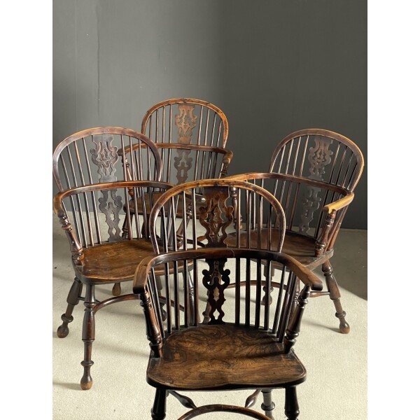 A set of 4 late 18th Century yew wood Windsor chairs