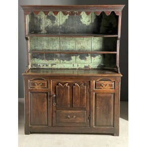 Welsh dresser oak of small proportions with some original painted decorations c1760