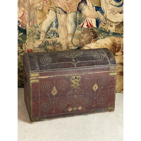 Leather and brass studded trunk in good condition c1690