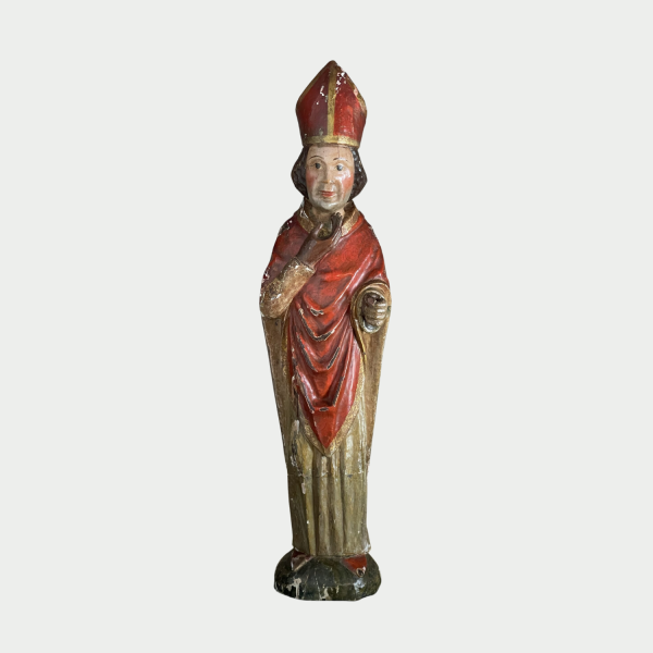 C1600 wood carving of a cardinal