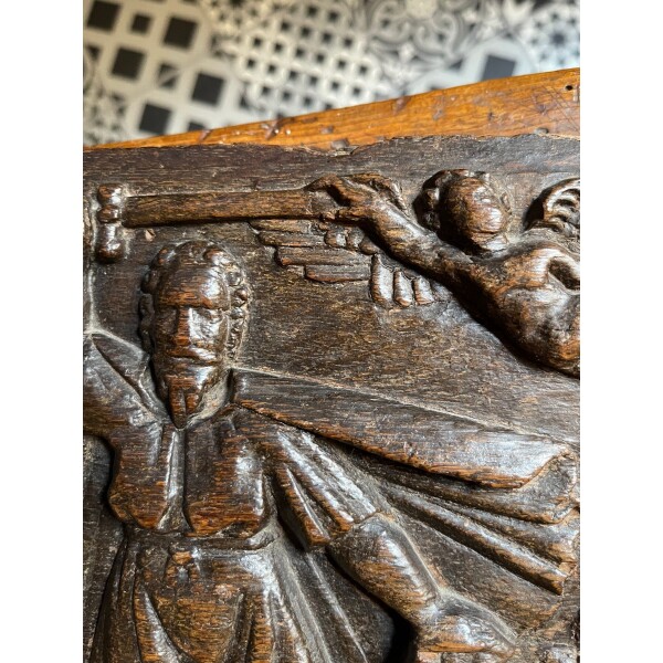 oak carving of depicting king Herod ordering killing young boys - details